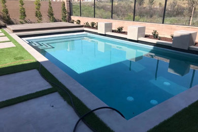 Trendy pool photo in Orange County