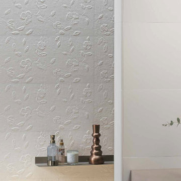 Modern white bathroom with subtle white porcelain tile