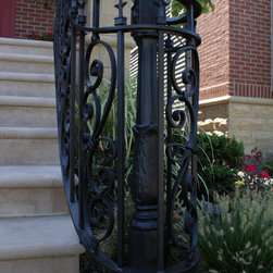Solid stone stairs with ornamental iron railing - Products