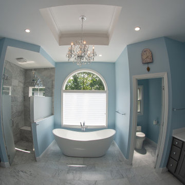 Traditional Master Bath Utilizing Frosted and Clear Glass