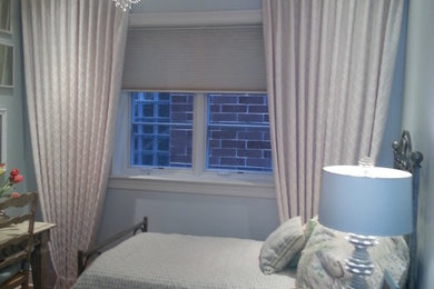 Side Panels in a Bedroom with Honeycomb Shade Behind