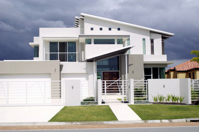 This is an example of a contemporary house exterior in Gold Coast - Tweed.