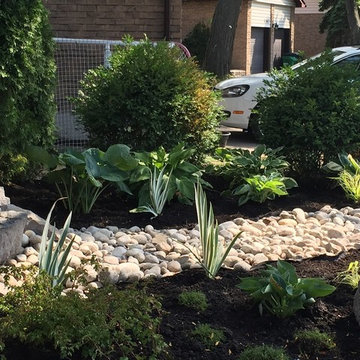 Front yard with no lawn and a lot of curb appeal