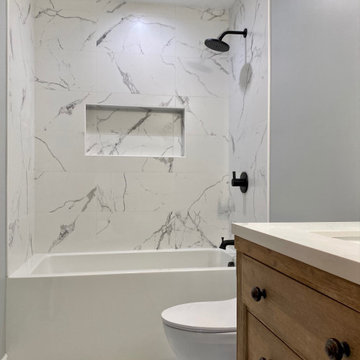 Hallway Bathroom custom tile work with shampoo niche