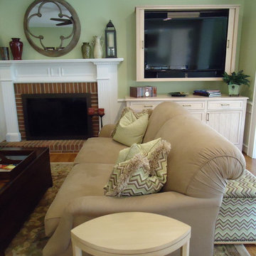 Transitional family room with hidden big screen tv
