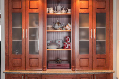 Mid-sized elegant l-shaped vinyl floor eat-in kitchen photo in Other with raised-panel cabinets, medium tone wood cabinets, quartz countertops, an island, an undermount sink, beige backsplash, ceramic backsplash and white appliances