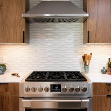 Stainless Steel Range and Hood in Restored Midcentury Modern Kitchen