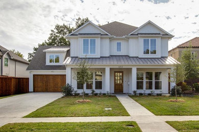 Inspiration for a large farmhouse white two-story wood exterior home remodel in Dallas