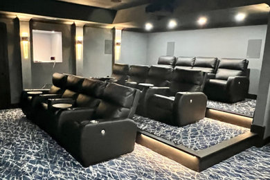 Example of a transitional home theater design in Atlanta