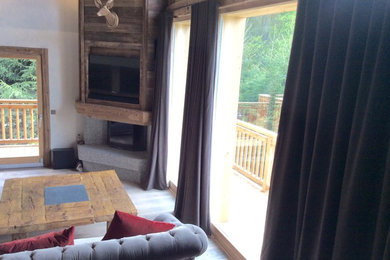 Inspiration for a rustic family room remodel in Lyon