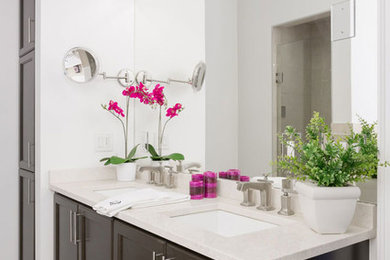 Bathroom - mid-sized transitional master brown tile and porcelain tile light wood floor bathroom idea in Toronto with flat-panel cabinets, dark wood cabinets, white walls, an undermount sink and granite countertops