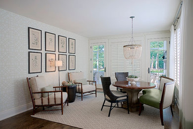 Inspiration for a mid-sized transitional dark wood floor and brown floor great room remodel in Chicago with white walls and no fireplace