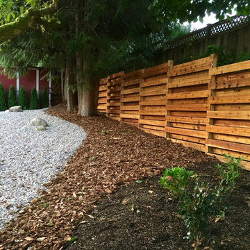 AFTER - Looking towards the back neighbors retaining wall