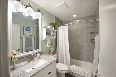 Inspiration for a small coastal green tile ceramic tile and gray floor bathroom remodel in Columbus with white cabinets