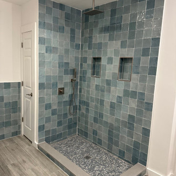 Rainfall shower with handheld sprayer