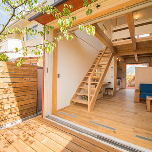 他の地域のアジアンスタイルのおしゃれな横庭のデッキ (張り出し屋根) の写真