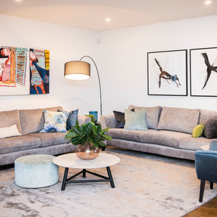 Photo of a mid-sized contemporary open concept living room in Melbourne with white walls, dark hardwood floors and brown floor.
