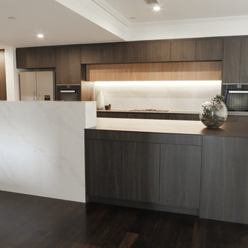 Penthouse Kitchen with Unique Calcutta and Oak