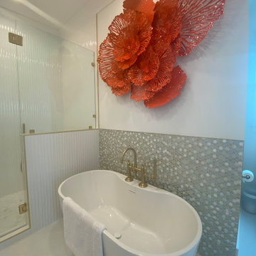 Stunning Bathroom with wavy tiles and penny round mosaic