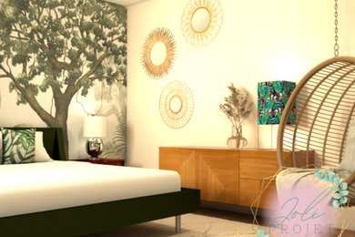 Diseño de dormitorio principal tropical de tamaño medio sin chimenea con paredes verdes, suelo de madera clara, suelo marrón y papel pintado