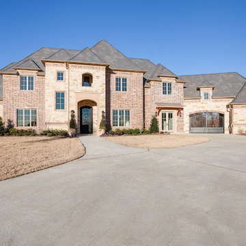 Traditional Brick & Stone with a Glamorous Interior