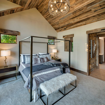 Reclaimed Wood Paneling and Timber Trim in Modern Rustic Bedroom