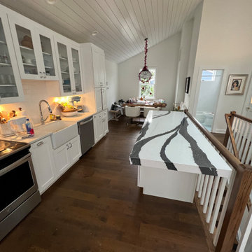 White Transitional Kitchen with a Statement Waterfall Island