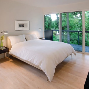River Home - Master Bedroom with a forest view