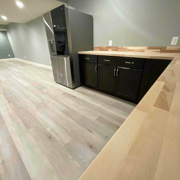 Basement kitchenette with butcher block counterop