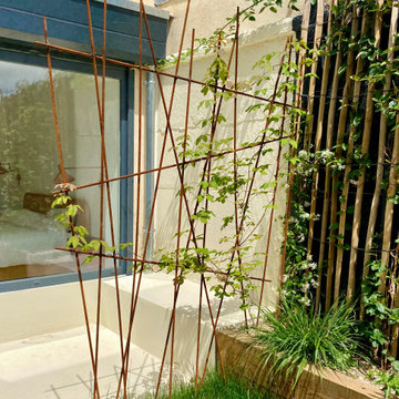 ESPRIT JUNGLE ET BORD DE PLAGE DANS UN JARDIN DE VILLE RIVE DROITE