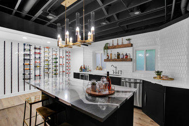 Inspiration for a large modern home bar remodel in Chicago