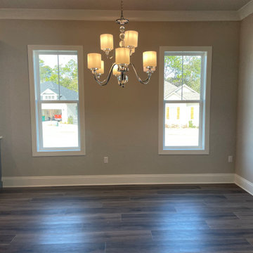 Beautifully installed 9x60 Luxury Vinyl Plank with a painted beveled edge