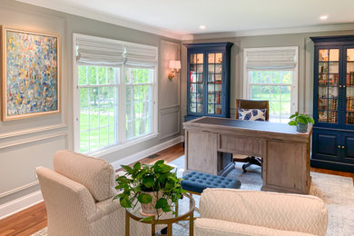 Example of a transitional home office design in New York