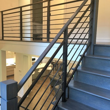 Amanda - horizontal steel railing with wooden newel posts