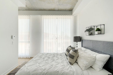 Photo of a modern bedroom in Montreal.