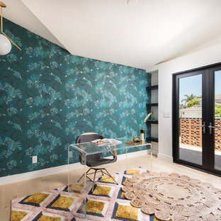 Medium sized modern study in San Diego with white walls, light hardwood flooring and a freestanding desk.