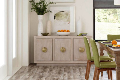 Example of a transitional dining room design in Other