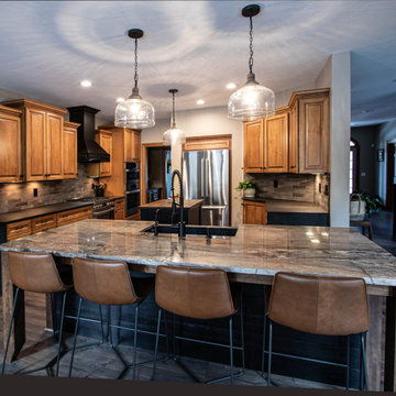 Reconfigured kitchen with new islands, countertops, backsplash