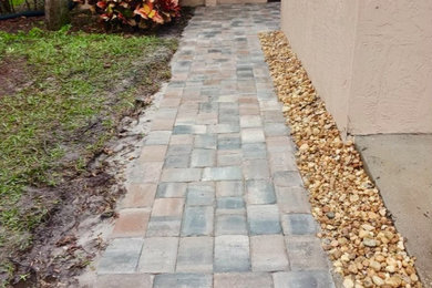 Photo of a front yard brick walkway in Other.