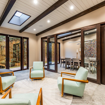 Interior Bi-Fold Doors Separate Formal Sitting Room from Dining Room