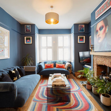 Blue colour drenched maximalist lounge