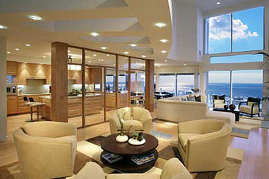 Inspiration for a large contemporary open concept living room remodel in Los Angeles with white walls, a standard fireplace, a stone fireplace and a concealed tv