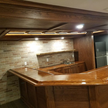 English style Bar/Pub, Finished basement, Custom tiled shower, custom cabinets