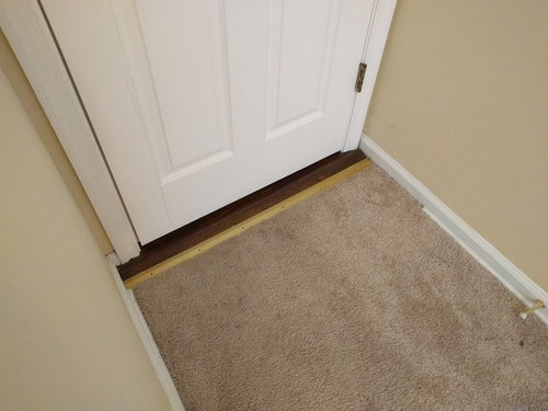 Hallway Hardwood Extends Into Bedroom