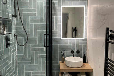 Example of a minimalist bathroom design in West Midlands