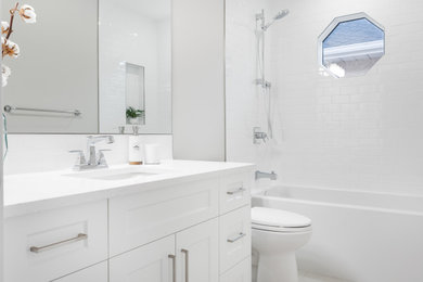 Transitional bathroom photo in Calgary