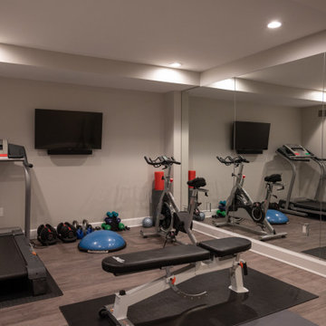 Finished Basement with Bar and Accent Wall in Commerce Twp., MI