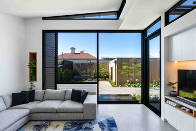 Photo of a contemporary family room in Melbourne.