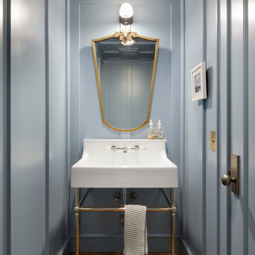 Weathered Antique Flooring in a Traditional Powder Room