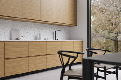 Eat-in kitchen - modern eat-in kitchen idea in San Francisco with flat-panel cabinets and light wood cabinets
